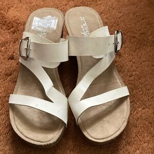 Size 7 1/2w all man made material very comfortable color white